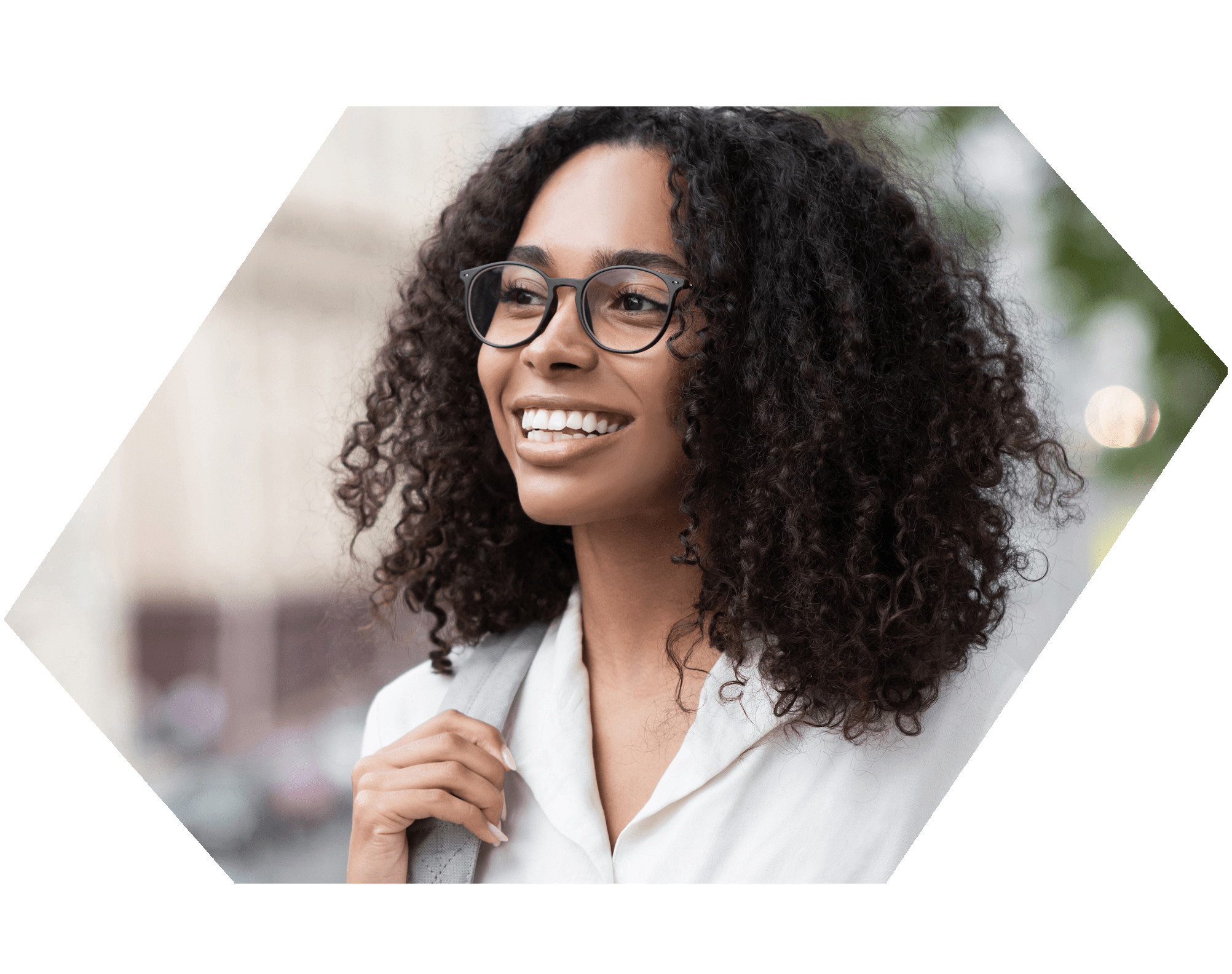 Smiling woman with curly dark hair